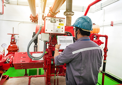 Engineer Checking Industrial Fire Control System