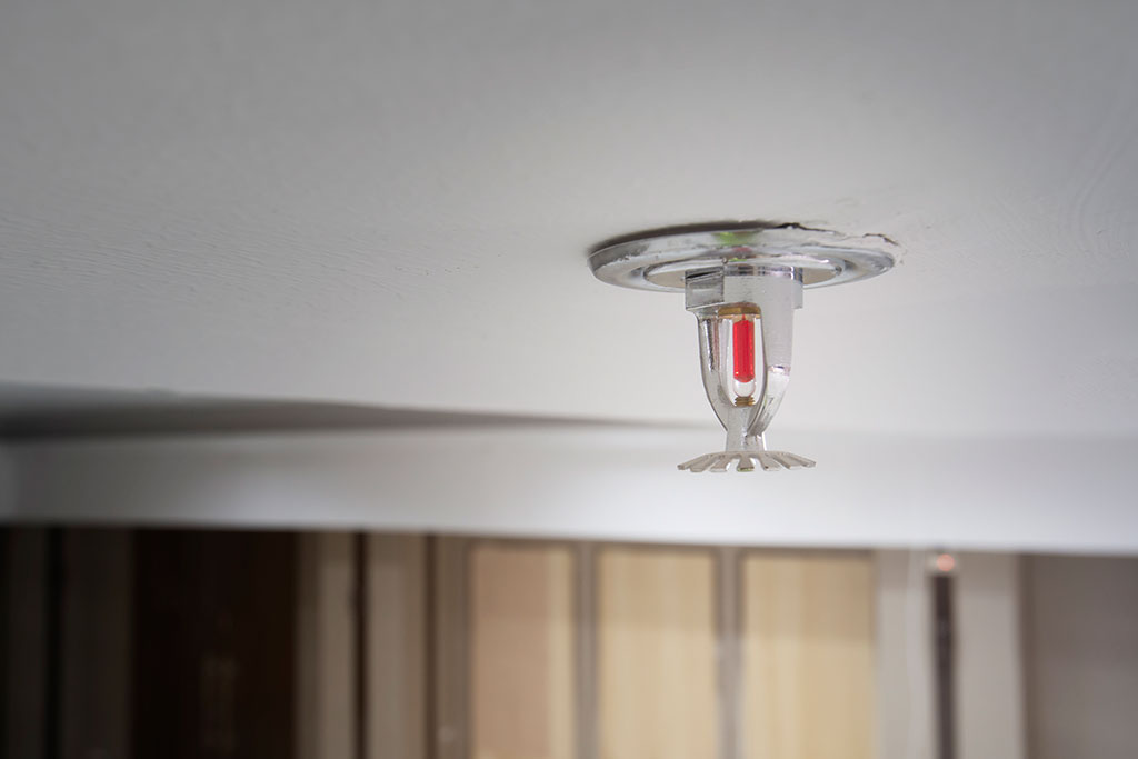 Fire extinguisher ceiling water springer on the wall
