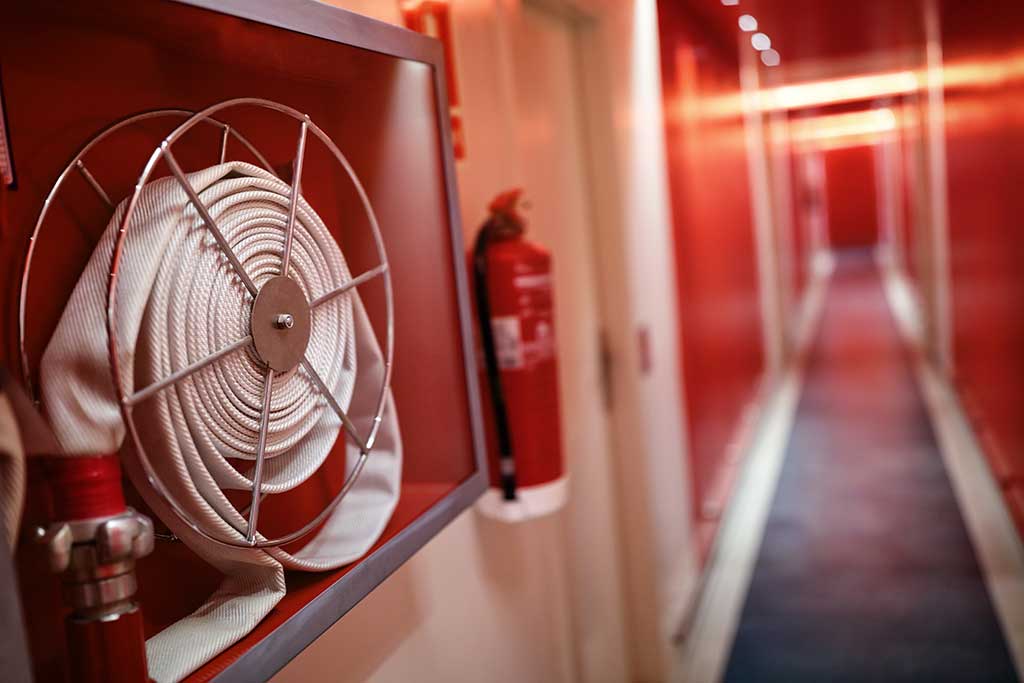 Fire extinguisher and hose reel